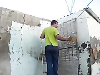 Worker on the roof rushing plump woman