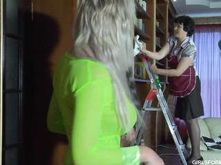 The landlady of the apartment offered to suck a strap-on to her mature housemaid