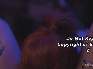 Redhead model licks pussy and caresses her friend in the shower