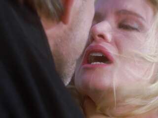 Kelly Lynch - public tits