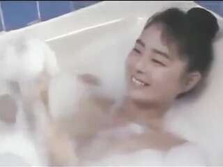 lecherous Asian beauties in light erotic video from the 80s or 90s