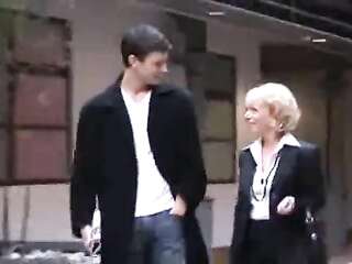 Mature boss with big tits has only selected young guys